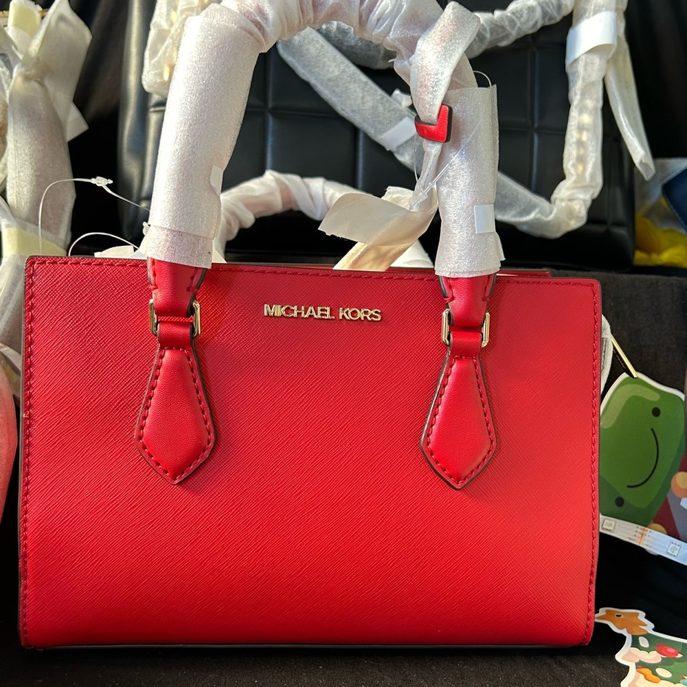 Michael Kors red women’s hand bag